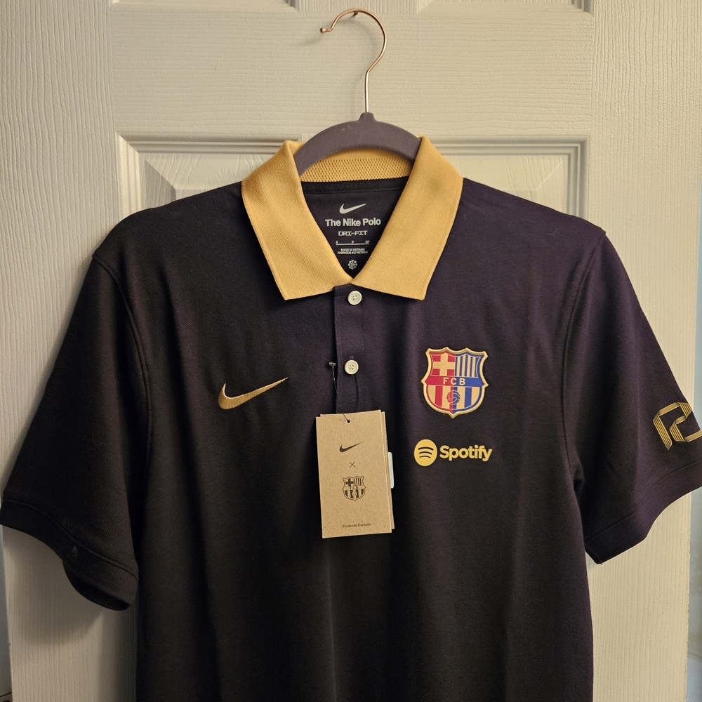 Nike Black Polo Shirt with Gold Accents